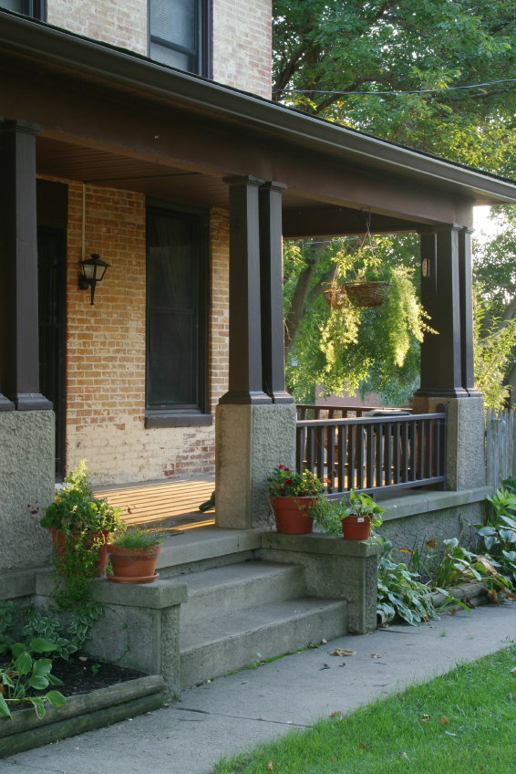 Evening Sun On Porch. In Springboro, Ohio. Dramatic evening lighting on historic structure.